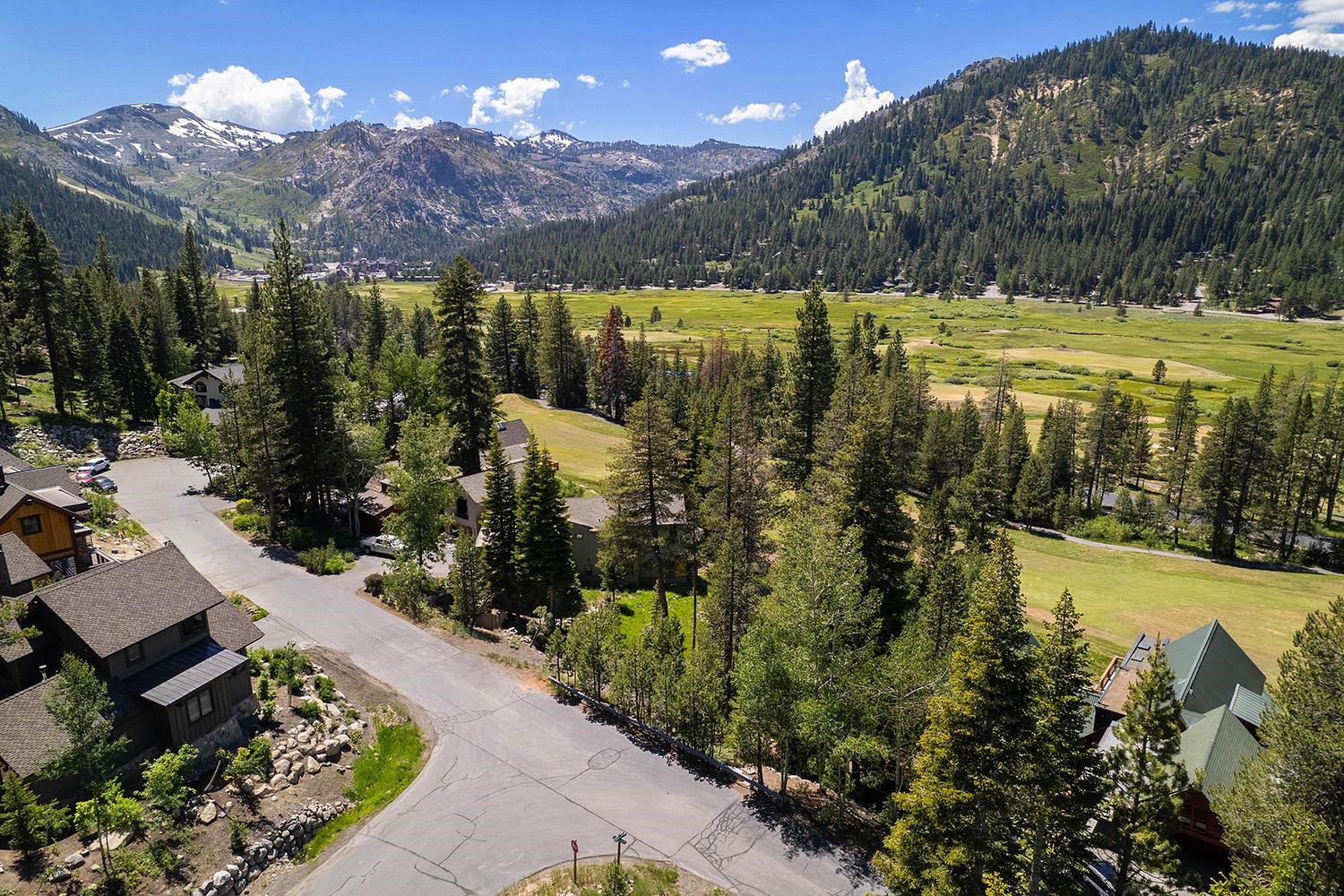 a view of a lake with a yard