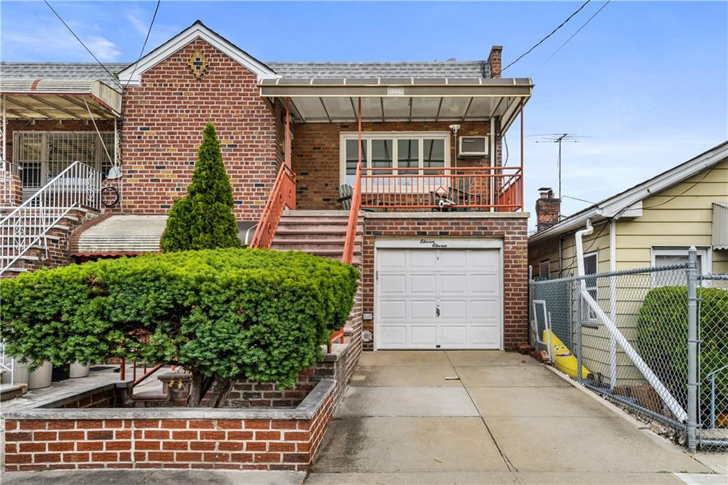 a view of a house with a garage