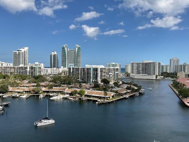 a view of a city with tall buildings