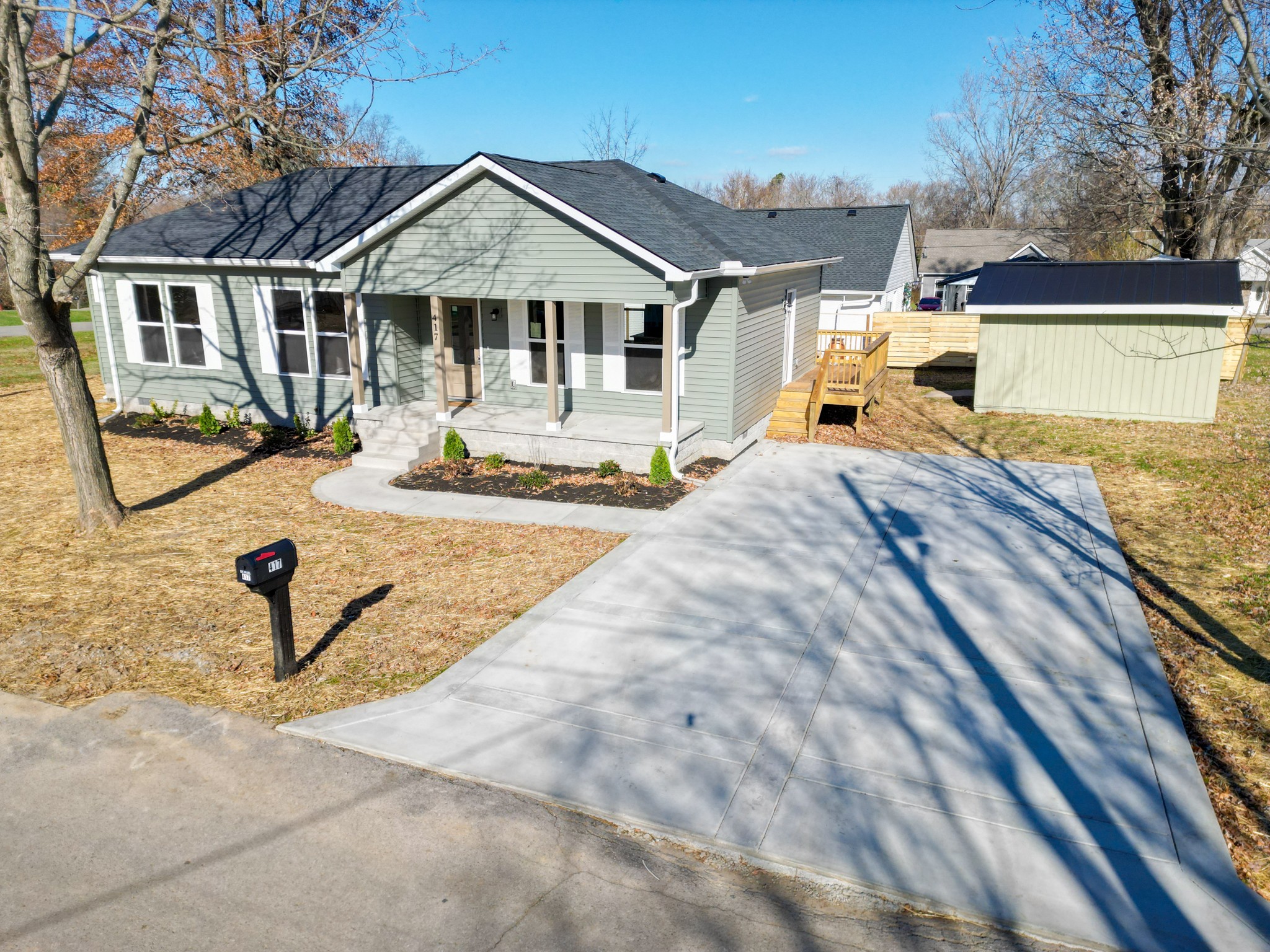 a front view of a house with yard