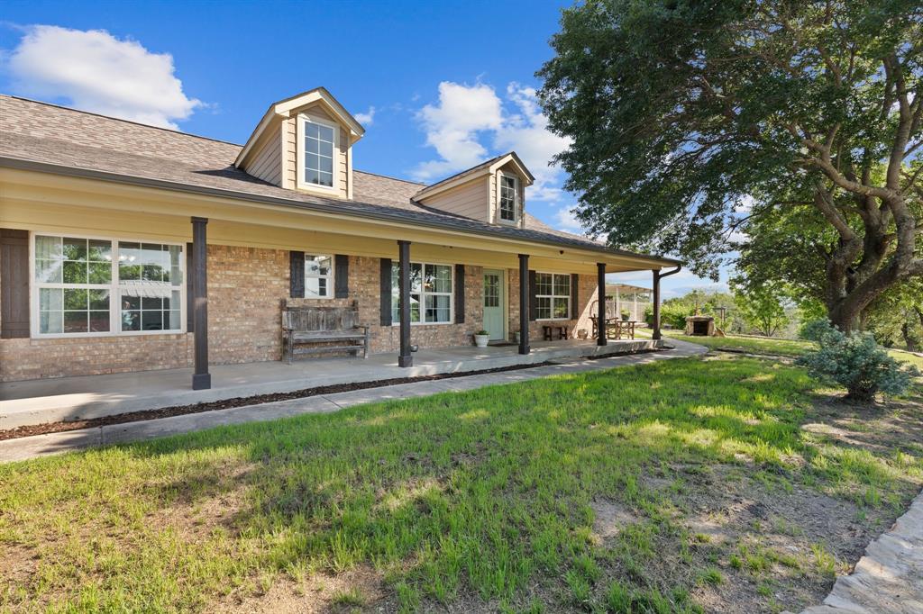 front view of a house with a yard