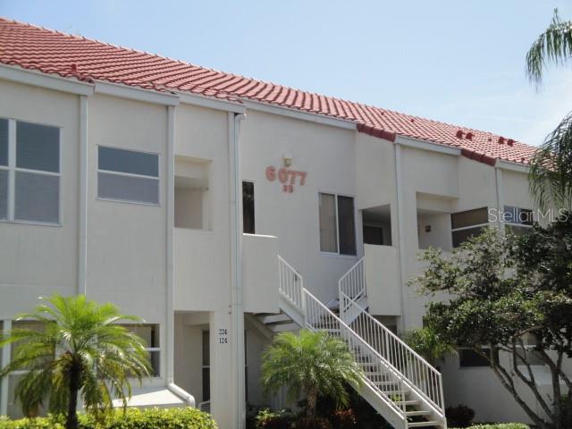 a front view of a house with a garage