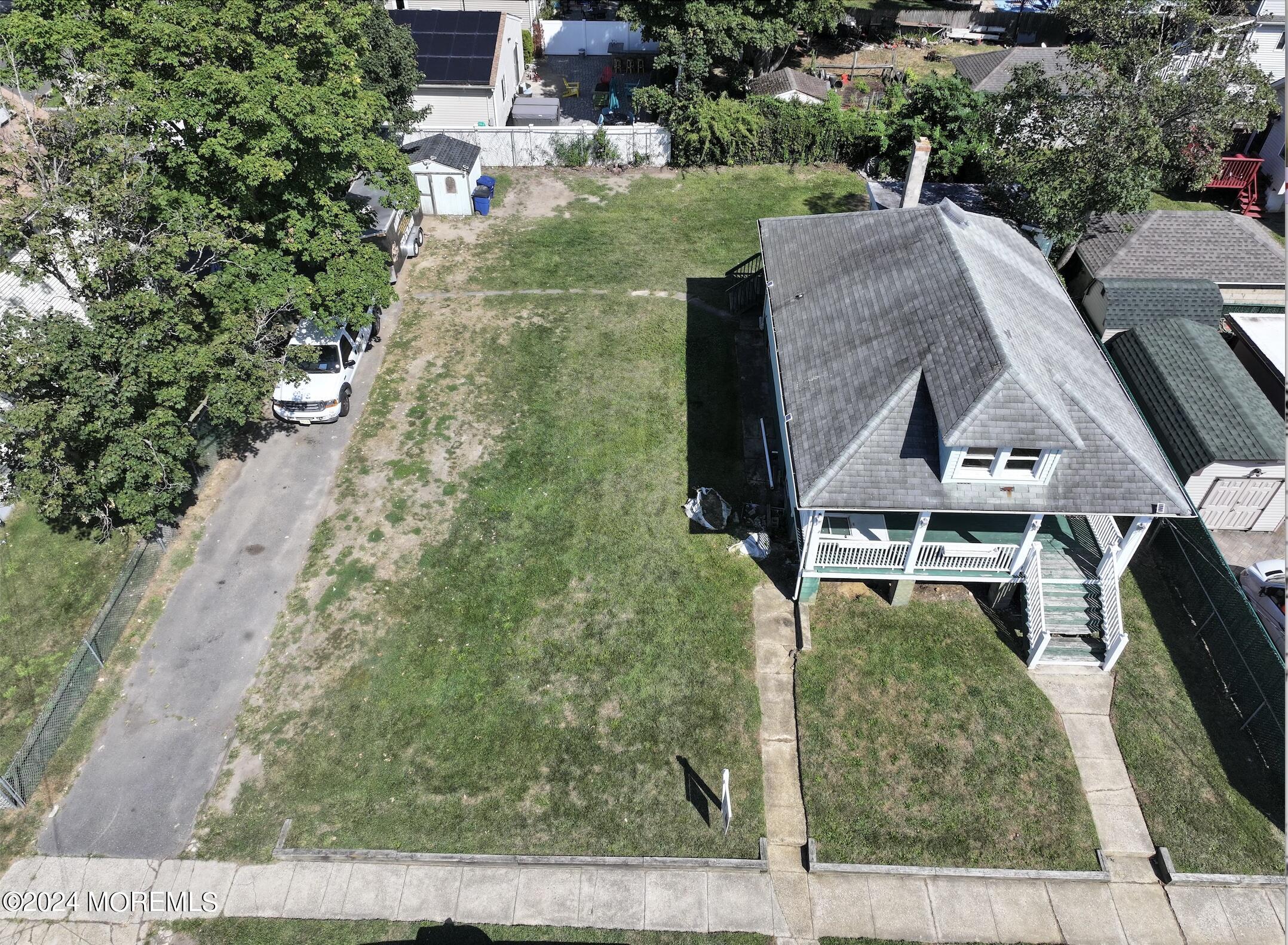 a aerial view of a house with garden