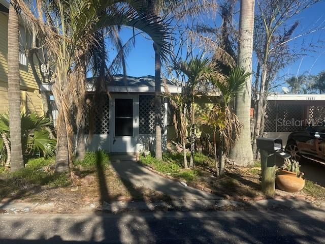 a house with trees in front of it