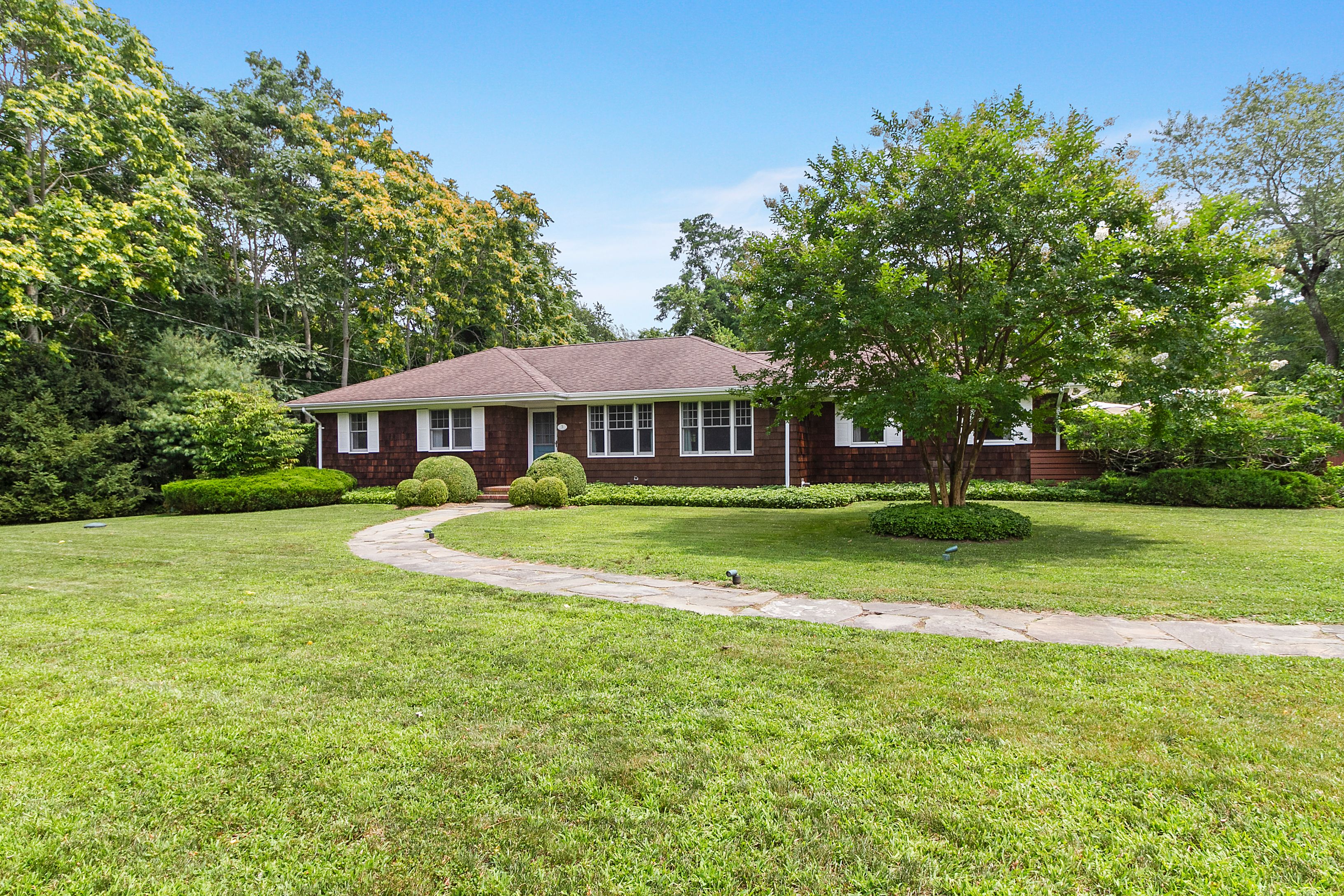 a view of a house with a big yard