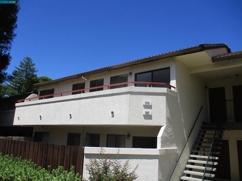 a view of a large building with wooden floor