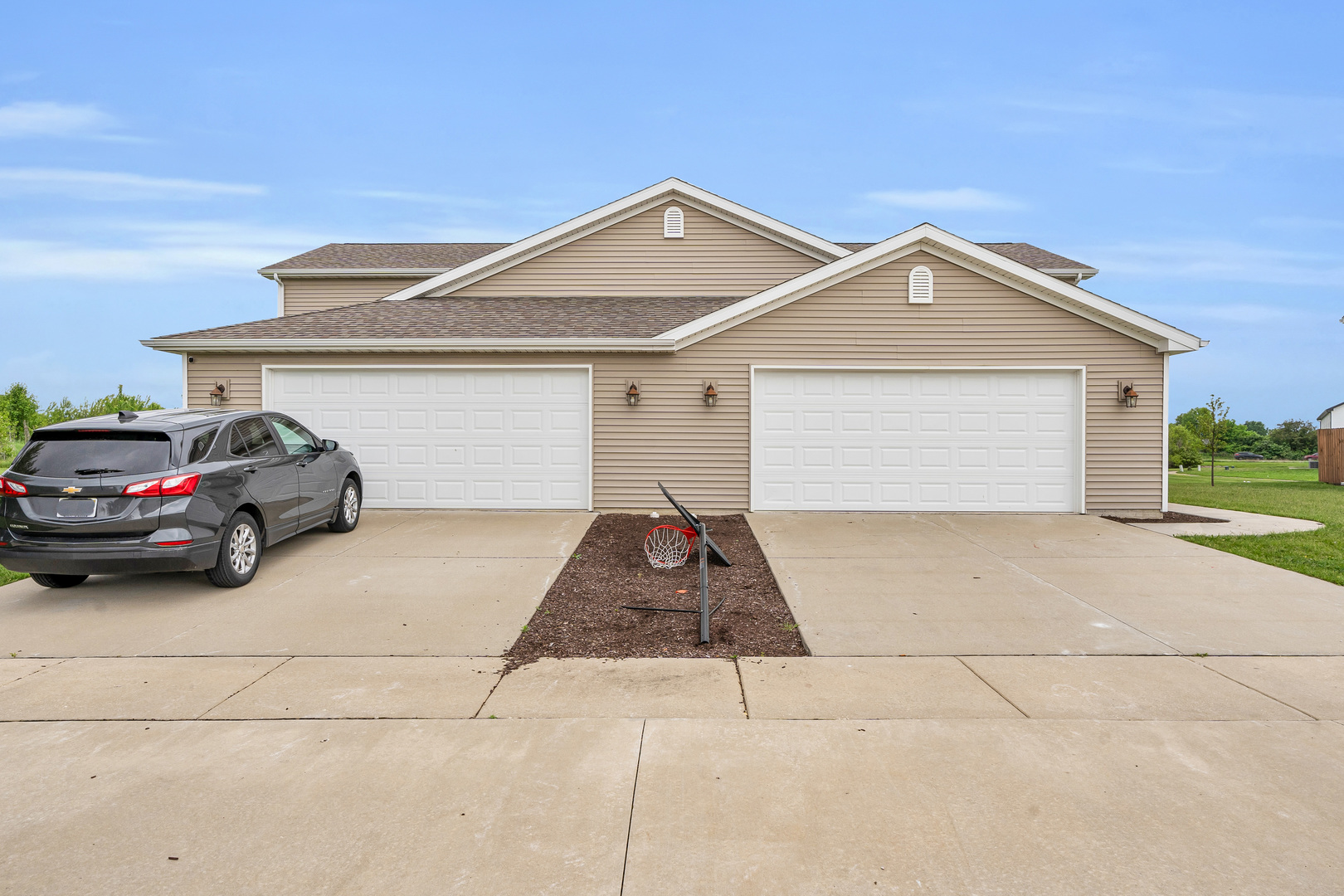 a view of a car parked in front of a house