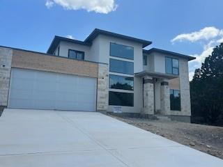 a view of a house with a garage