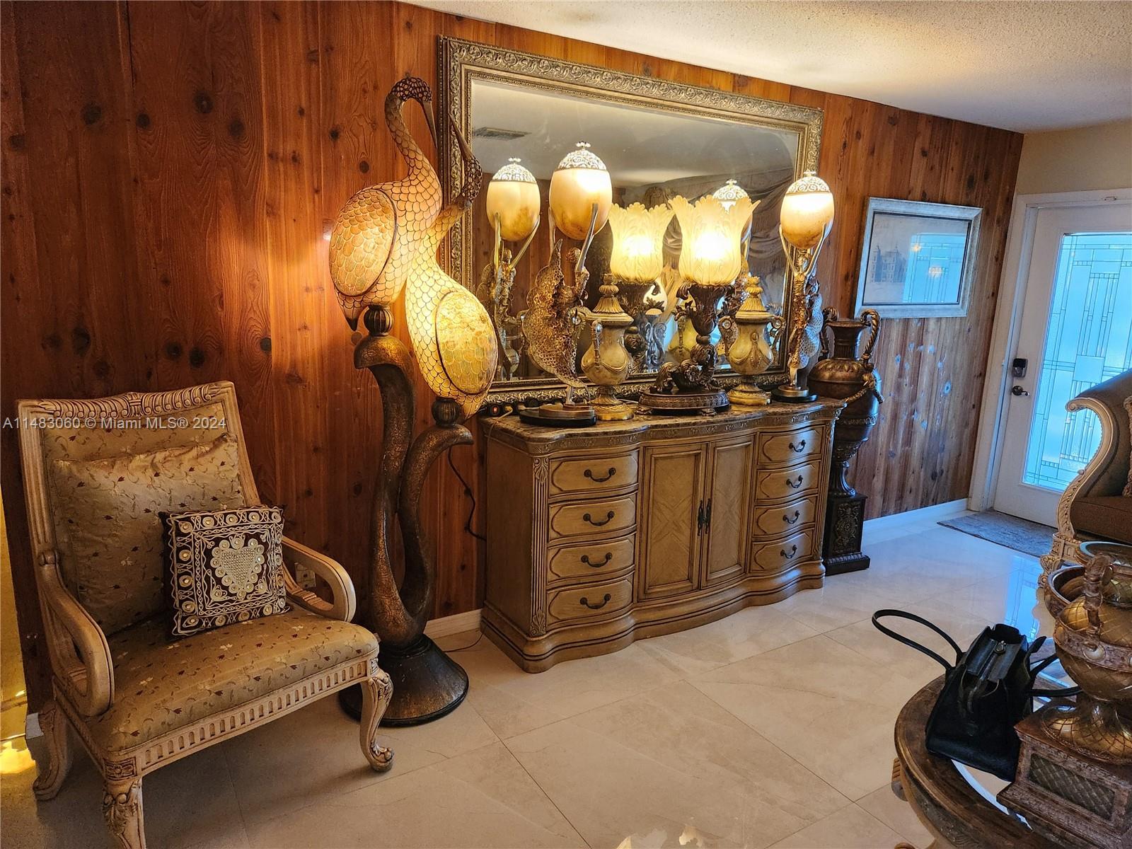 a view of a livingroom with furniture and storage