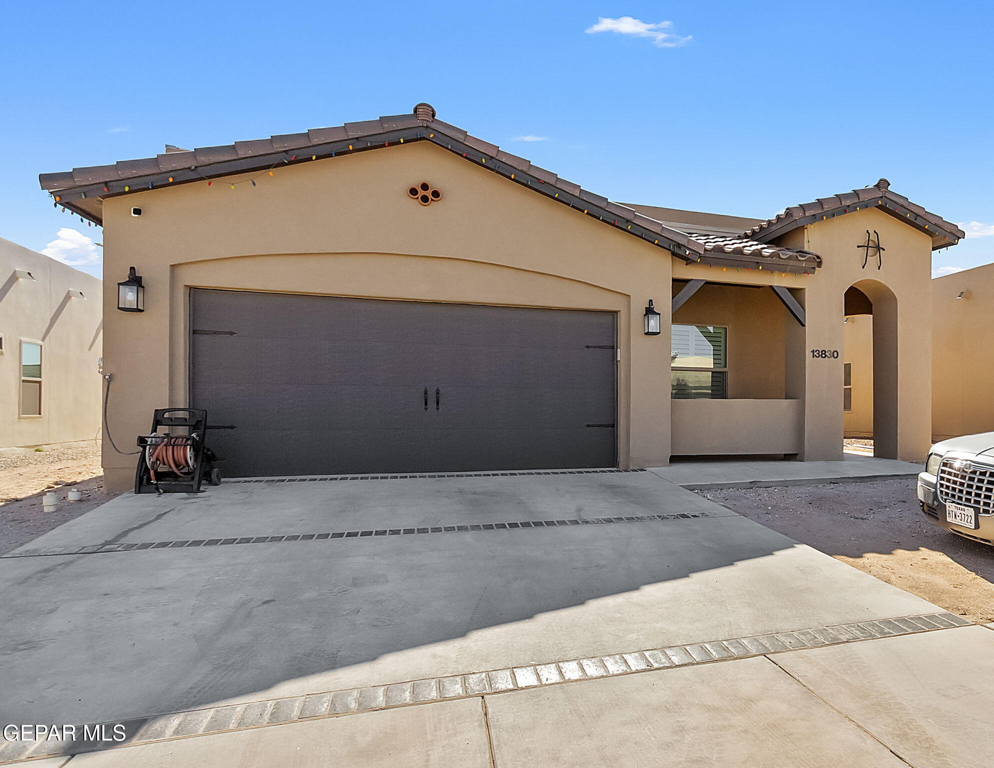 a view of a house with a garage and a garage