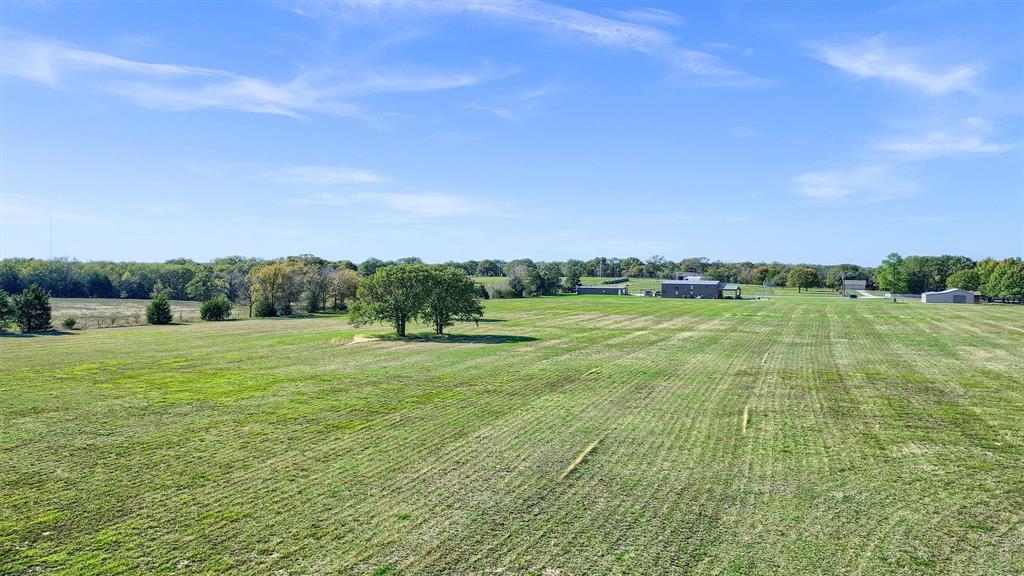 a view of an outdoor space and a yard