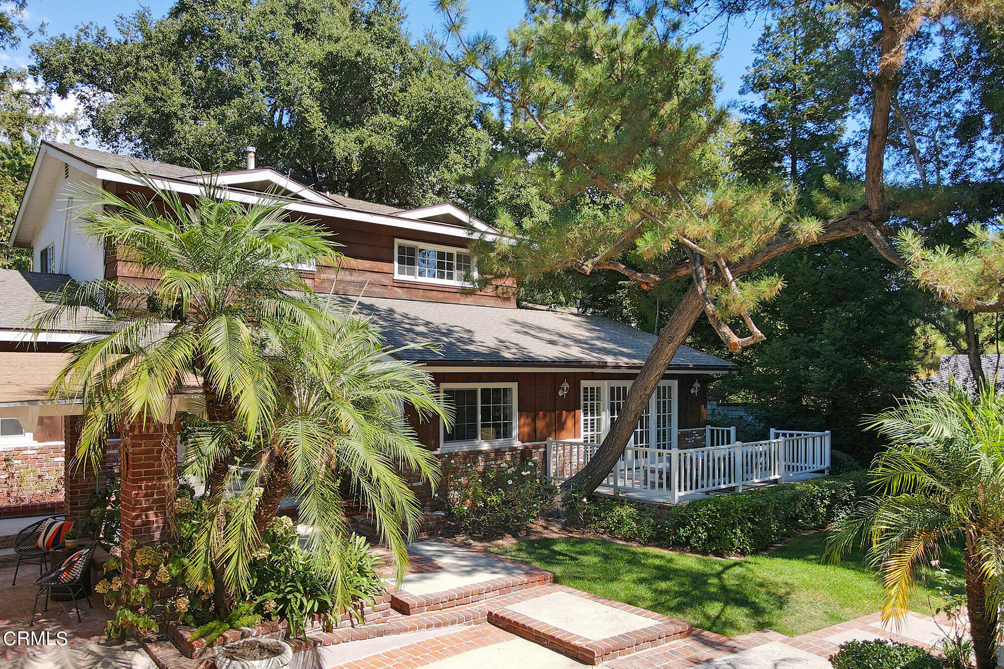 a aerial view of a house with a yard