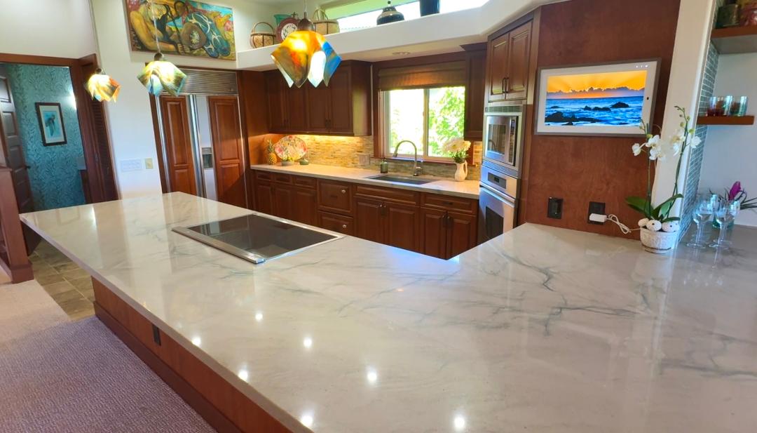 a large kitchen with stainless steel appliances kitchen island a large island in the kitchen