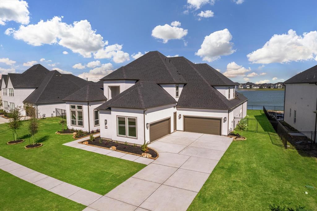 Welcome to 1783 Lake Crest Ln! This exceptional luxury home is one of the last available homes on the 36-Acre lake at Avalon in Friendswood! Smart Home Features. New Construction. Never Lived In. Friendswood ISD.