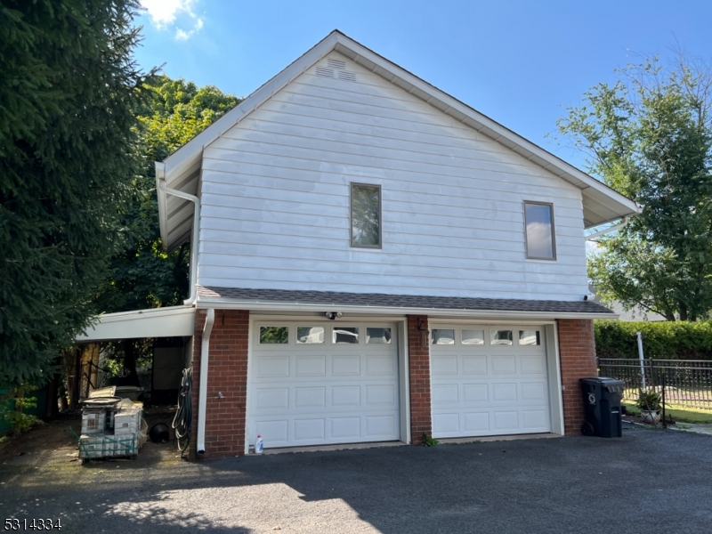 a front view of a house with a garage