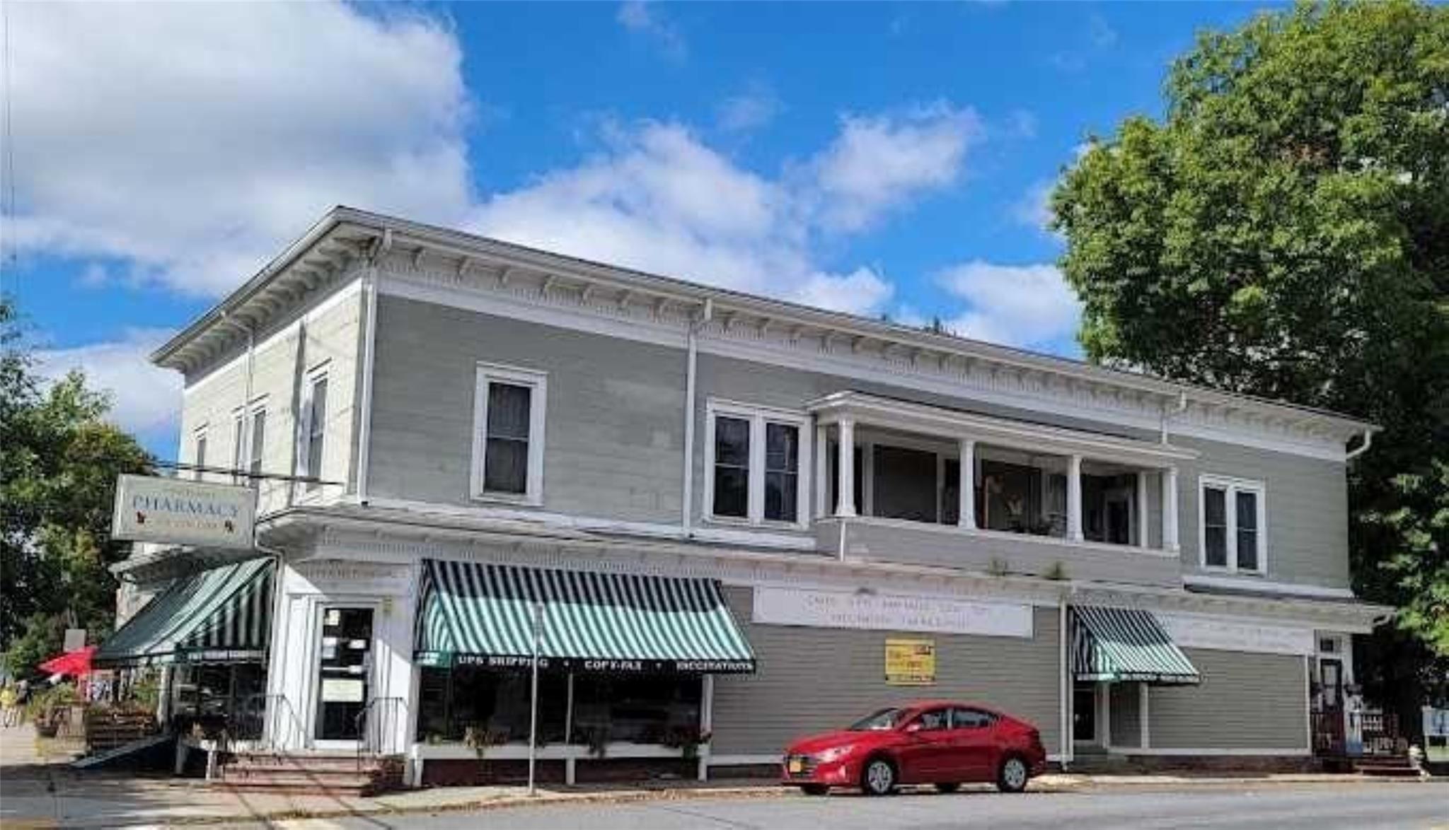 a front view of a building with street