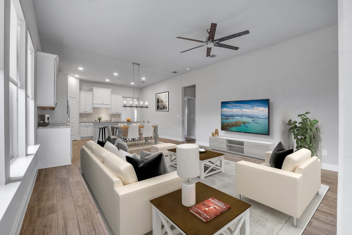 a living room with furniture and a table