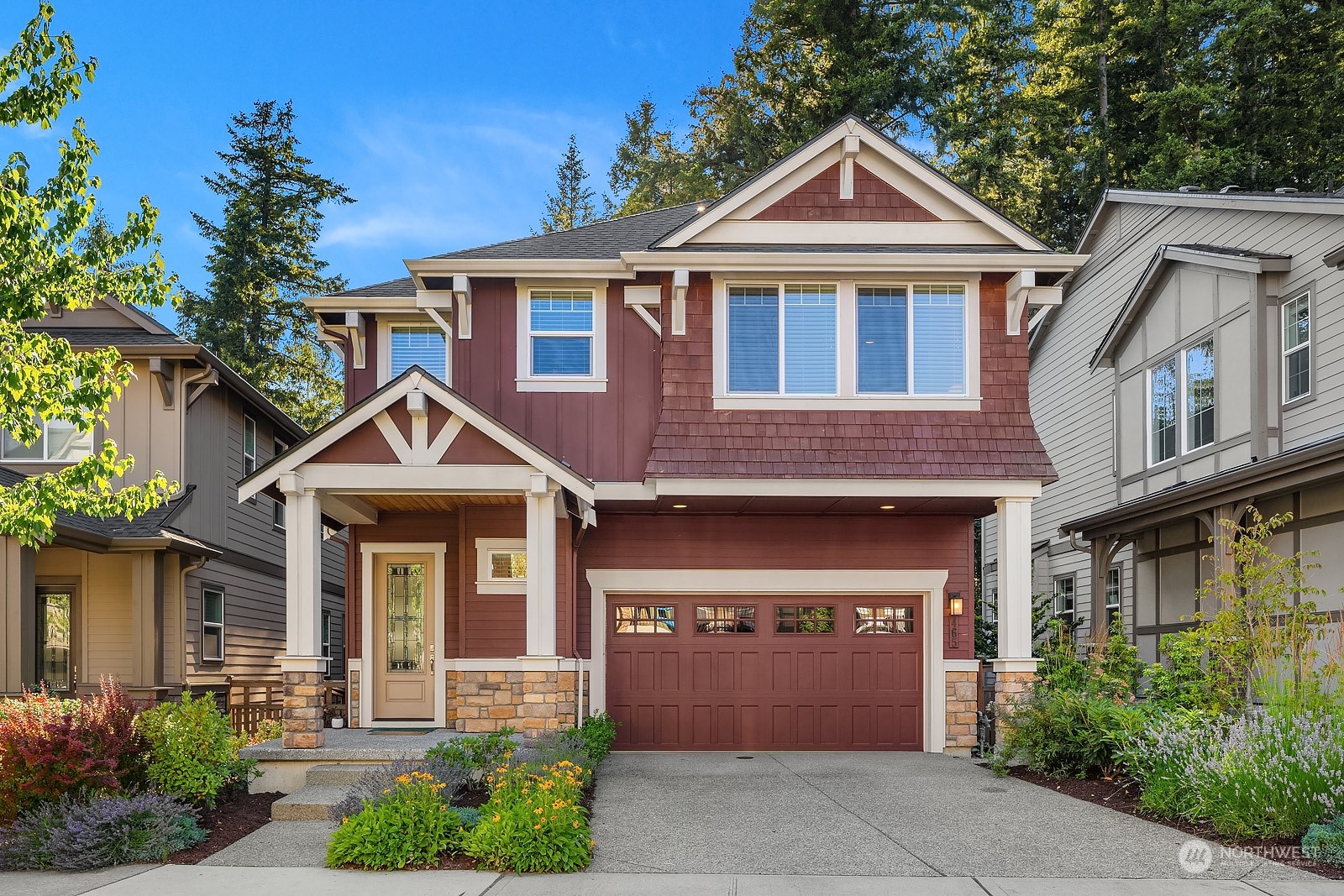 a front view of a house with yard