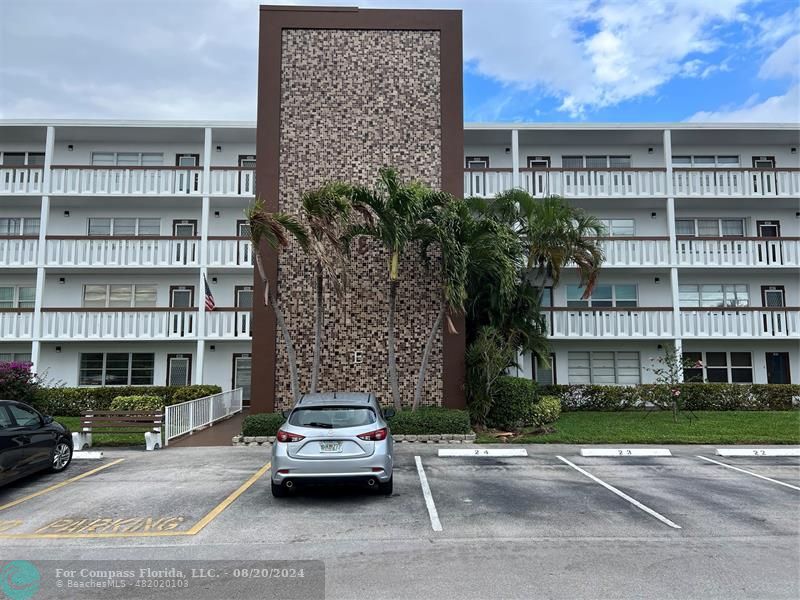 a car parked in front of a building