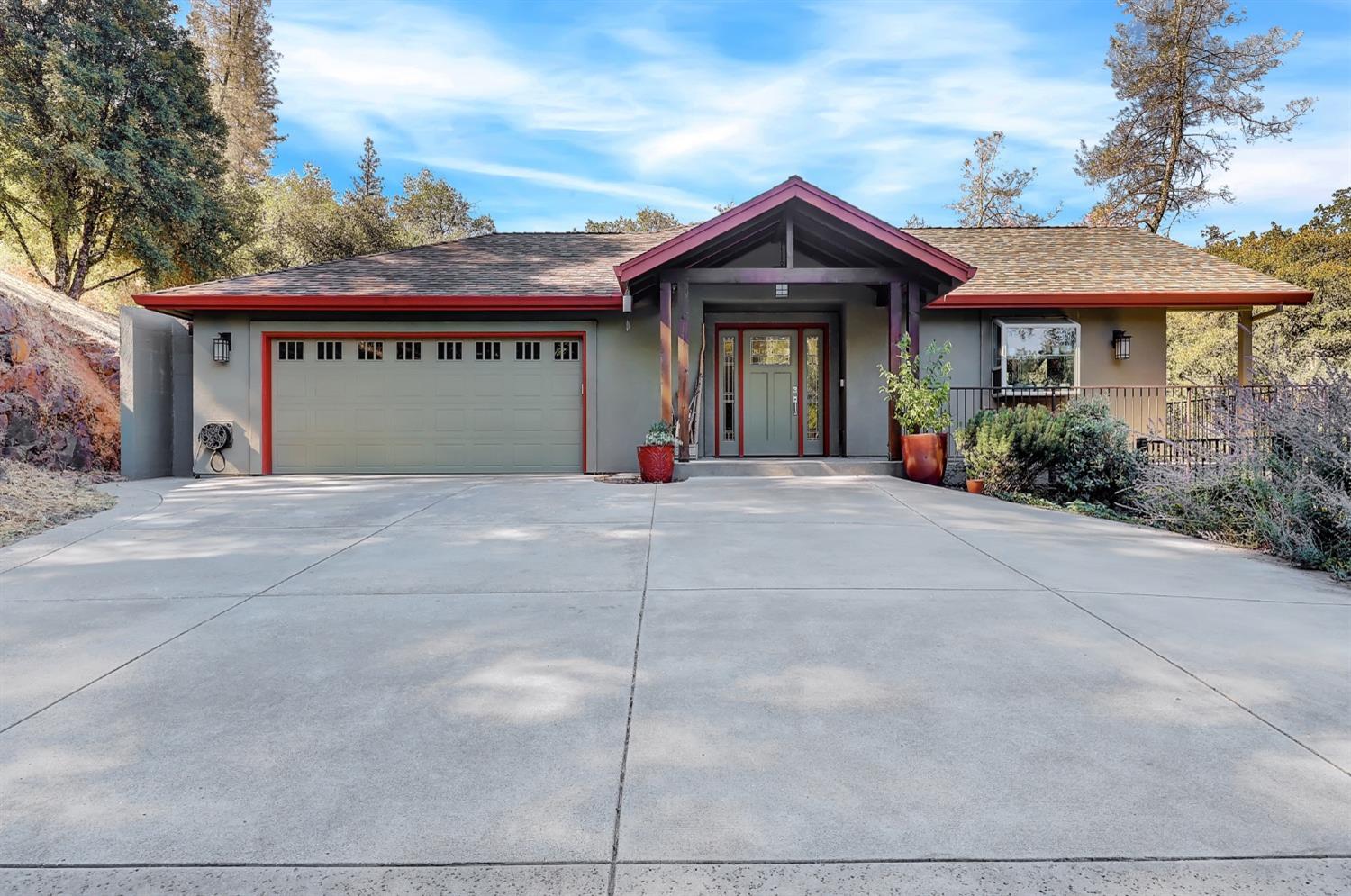 a front view of a house with a garage