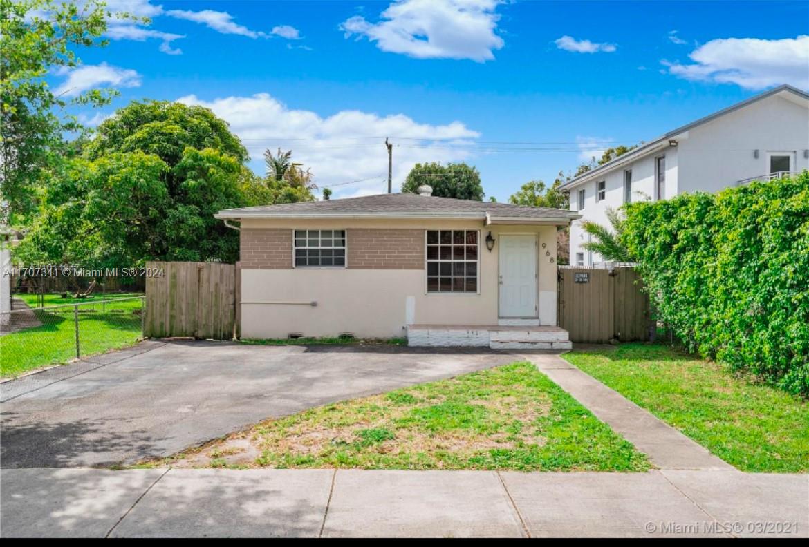 a house view with a garden space