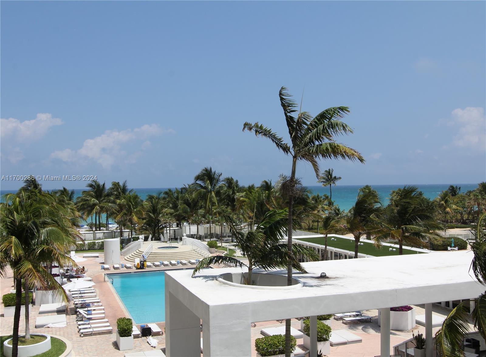 a view of a patio with swimming pool