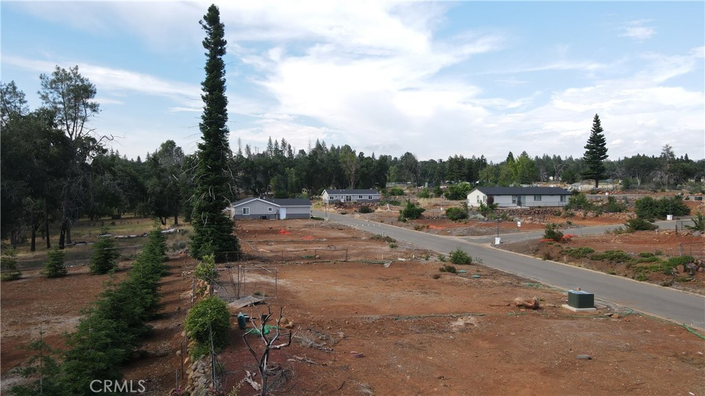 a view of a town with trees around