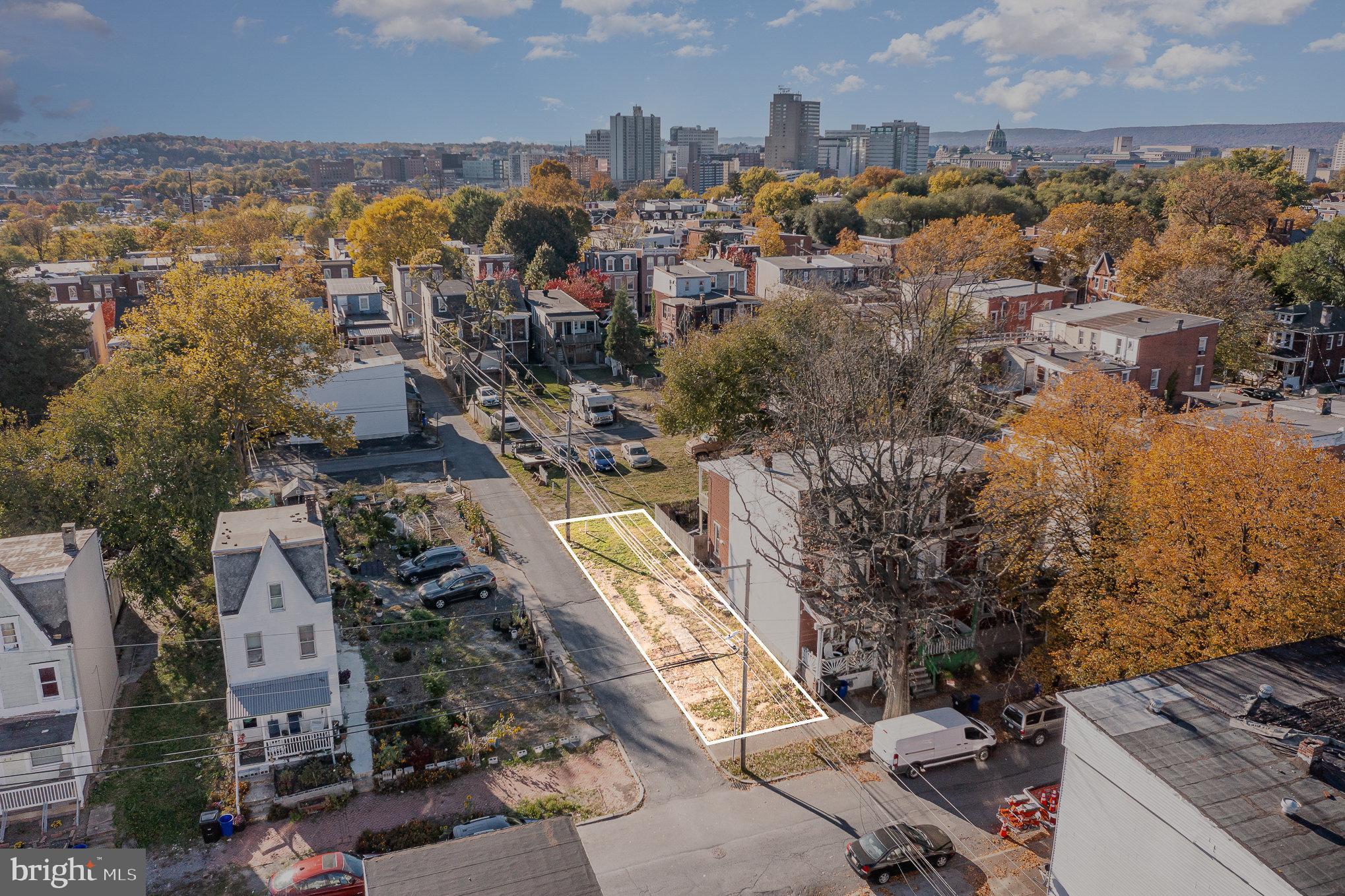 an aerial view of a city with lots of residential buildings