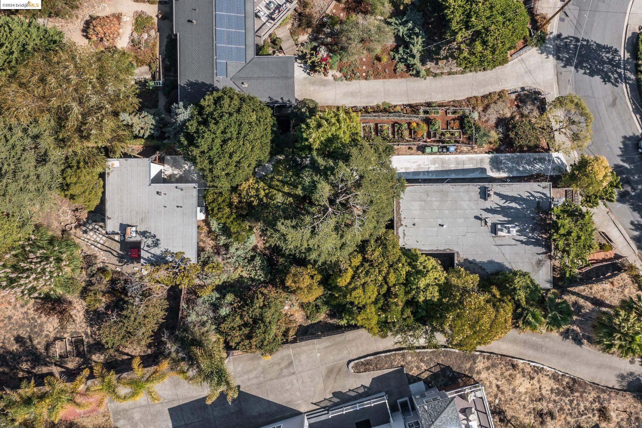 Drone photo of the 2 houses located on 1 large 13,780 square foot lot.