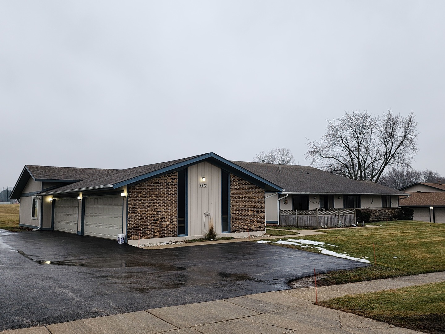 a front view of a house with garage