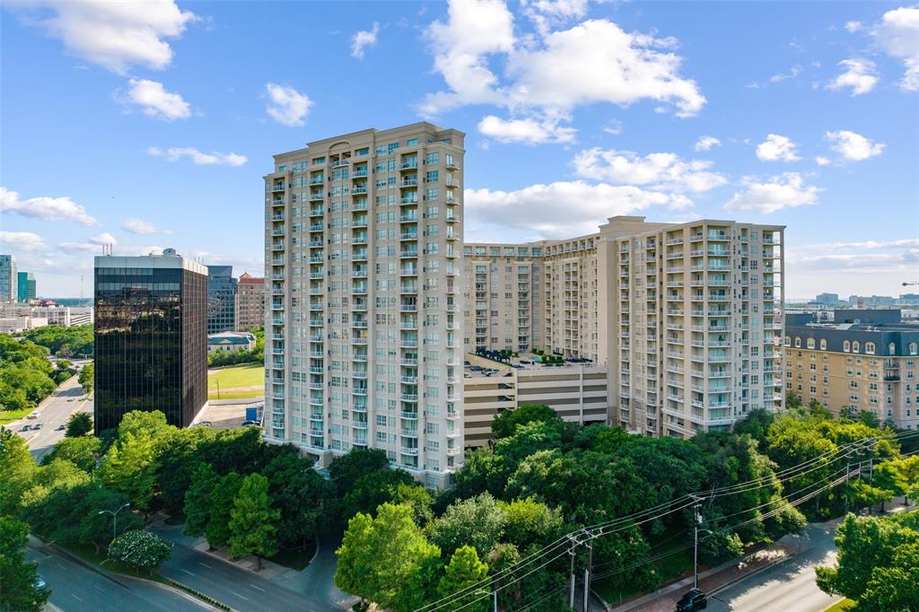 a view of a city with tall buildings