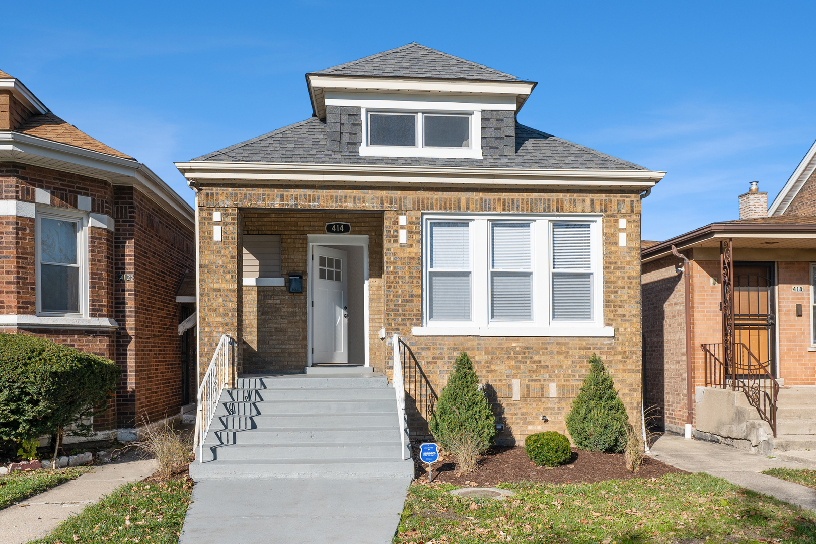 a front view of a house with a window