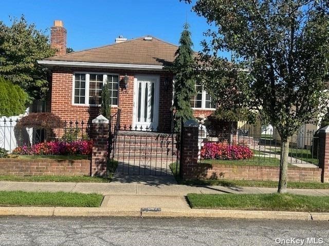 a front view of a house with garage