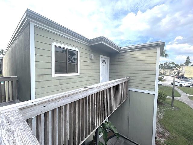 a view of a balcony with furniture