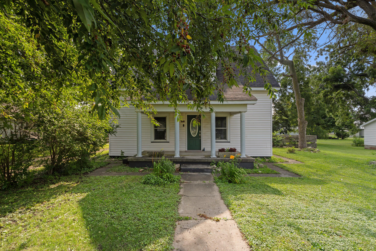 front view of a house with a yard