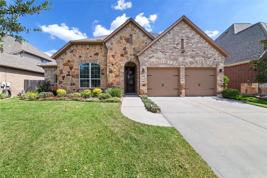 Charming front with stone and brick.