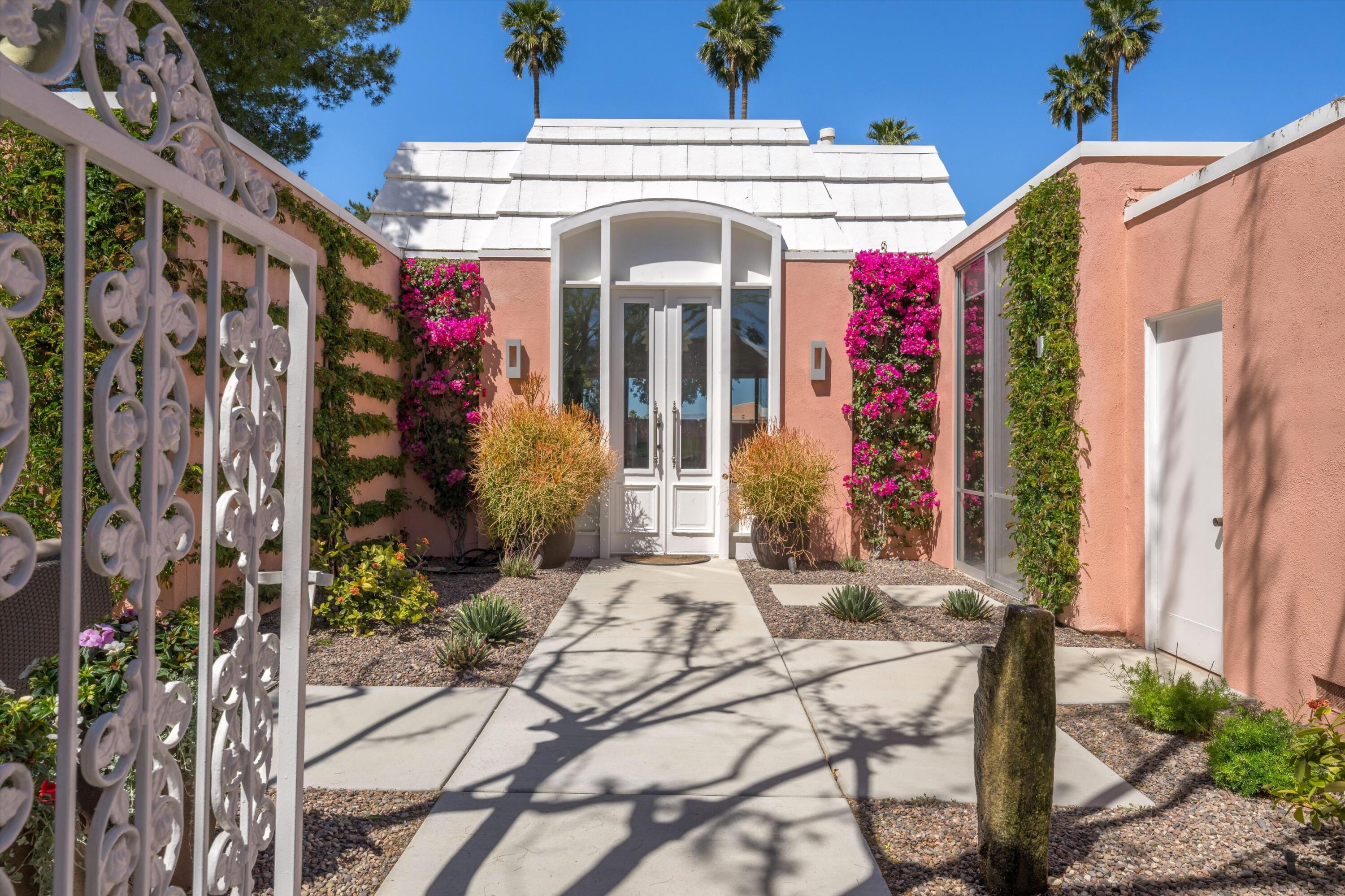 a front view of a house with patio