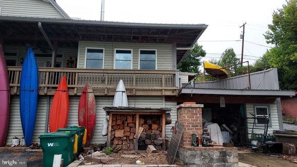 a front view of a building with retail shops