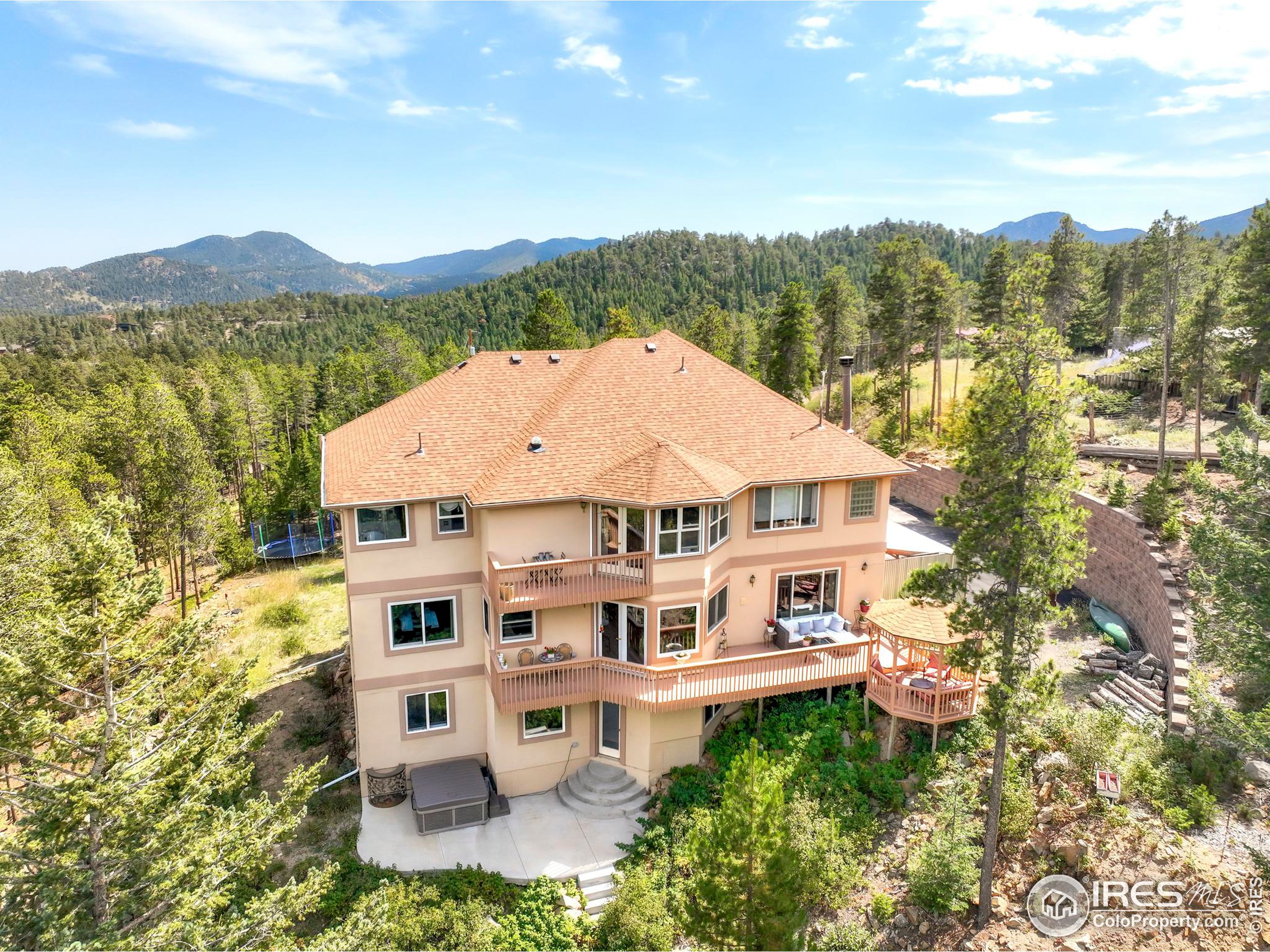 an aerial view of a house with a garden