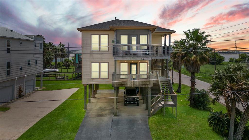 a front view of a house with yard