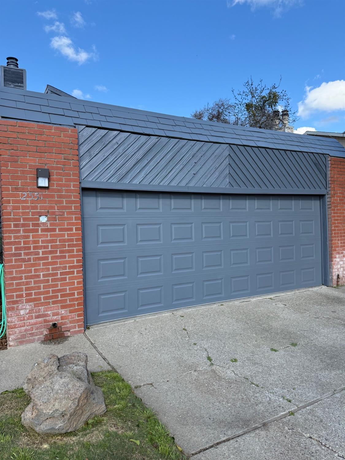 a view of outdoor space garage and window