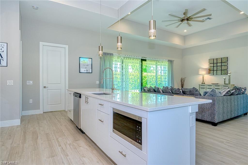 a kitchen with a stove and a dishwasher