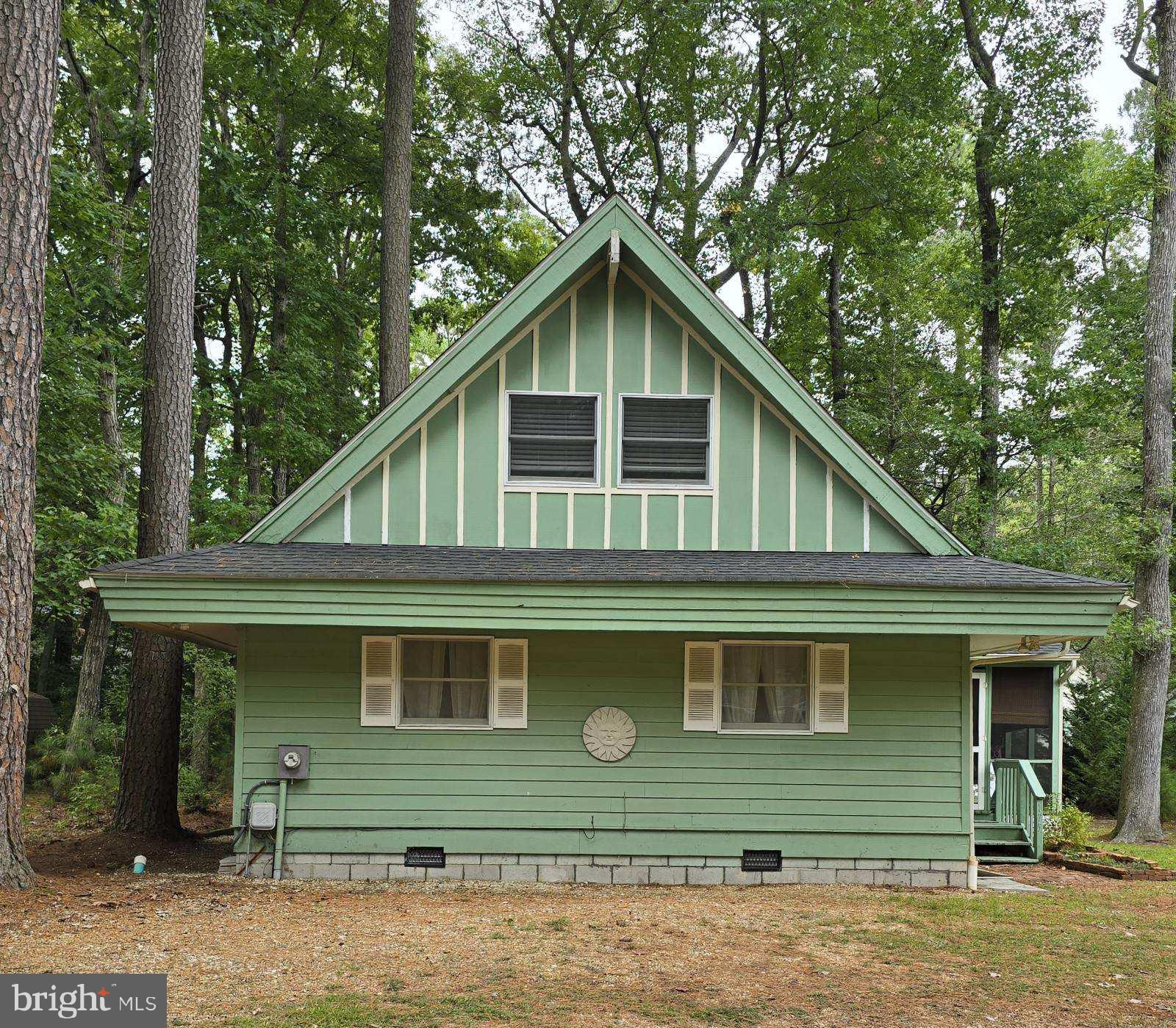 a front view of a house with garage