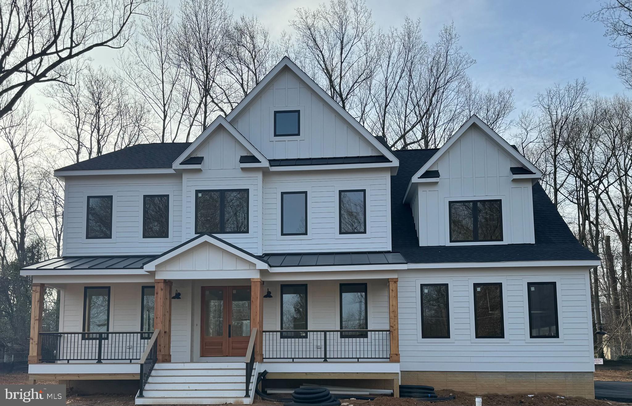 a front view of a house with stairs