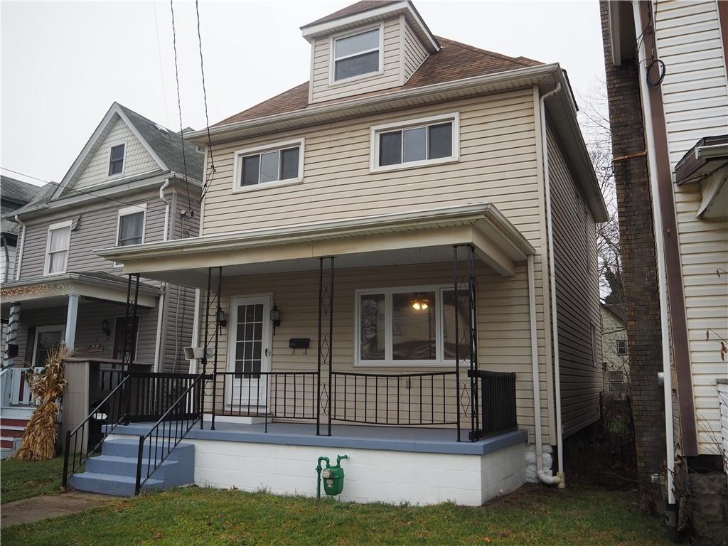 a view of a house with a patio