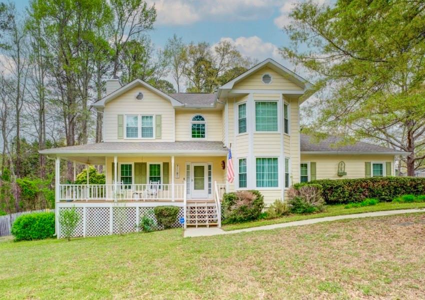 front view of house with a yard