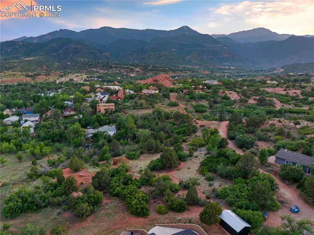 an aerial view of residential house and green space