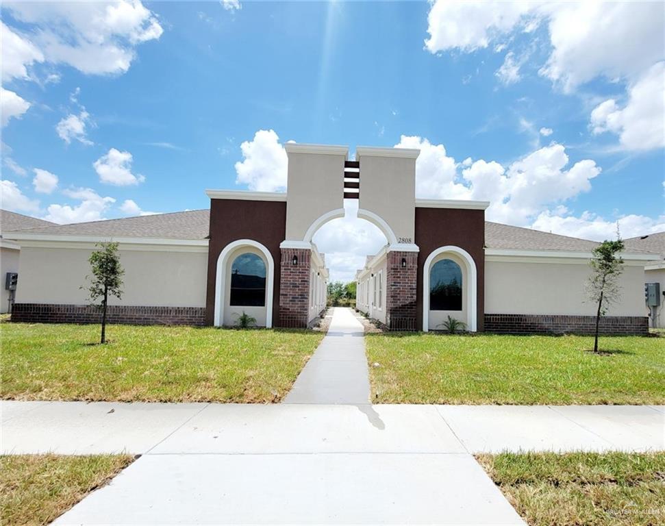 View of front of property featuring a front lawn