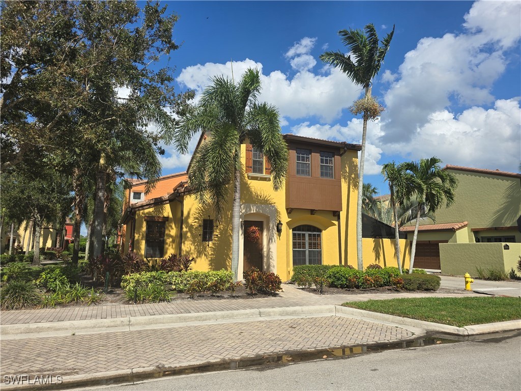 front view of a house with a street