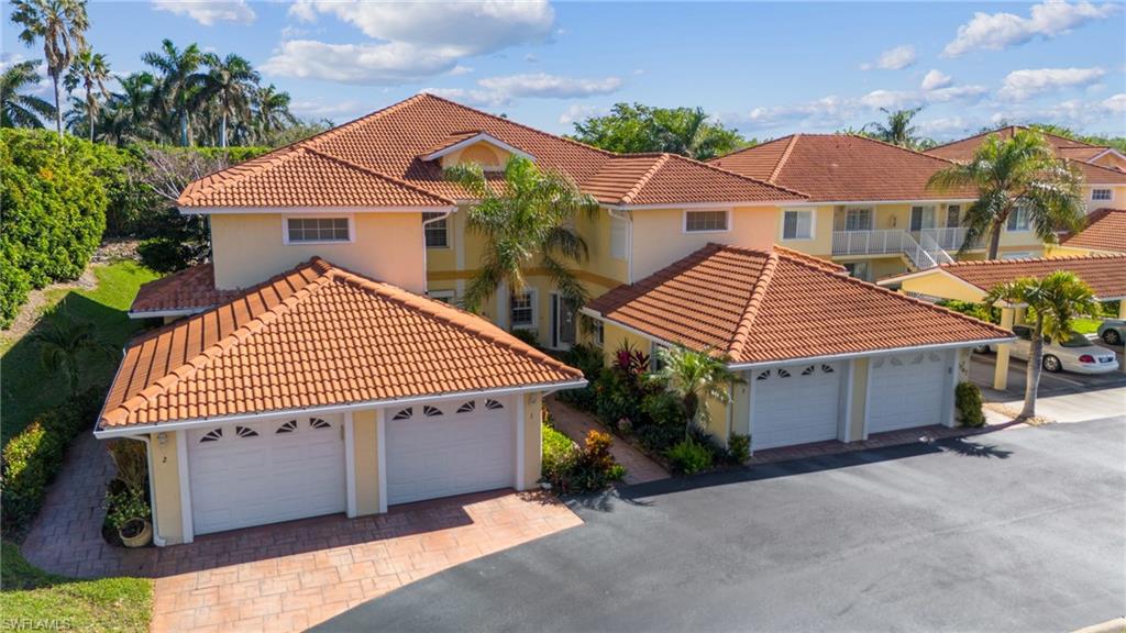 a front view of a house with a garage